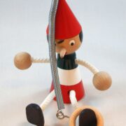 Pinokkio met springveer in groen/wit/rood 13 cm